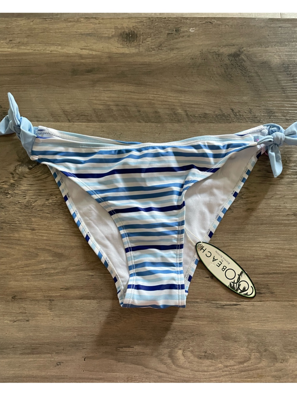 Coco beach Rhona Sutton Disney Parks blue white striped tie sides bikini bottom